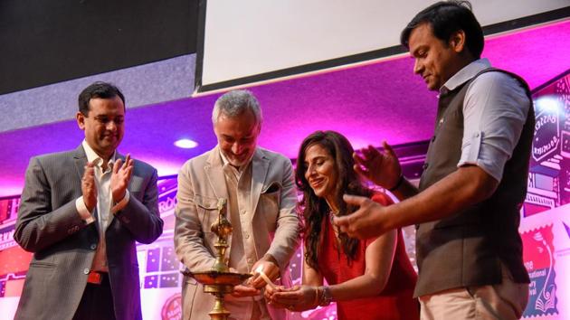 (From left) Bharat Agarwal, managing director of Vishwakarma Publications; Lorenzo Angeloni, Italian ambassador to India and Nepal; columnist - author Shobhaa De and Rahul Karad, executive president, MIT World Peace University (WPU), inaugurate Pilf 2018 at Yashada on Friday. (SANKET WANKHADE/HT PHOTO)