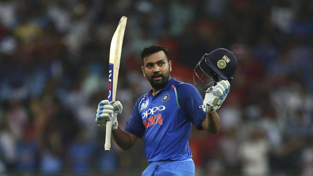 Dubai: India's captain Rohit Sharma raises his bat and helmet to celebrate scoring a century during the one day international cricket match of Asia Cup between India and Pakistan in Dubai. (AP) Dubai: India's captain Rohit Sharma raises his bat and helmet to celebrate scoring a century during the one day international cricket match of Asia Cup between India and Pakistan in Dubai. (AP)
