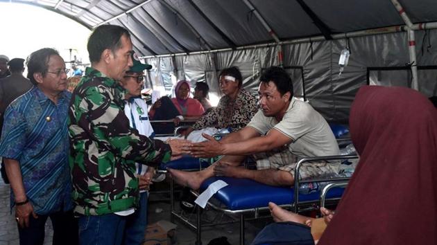 President Joko Widodo (pictured) toured Palu on Sunday and said rescuers were having difficulty reaching victims because of the shortage of heavy equipment. Fuel, electricity and food are also in short supply. “There are many challenges,” Widodo said. “We have to do many things soon, but conditions do not allow us to do so.” (Antara Foto / Biropers-Kris via REUTERS) President Joko Widodo (pictured) toured Palu on Sunday and said rescuers were having difficulty reaching victims because of the shortage of heavy equipment. Fuel, electricity and food are also in short supply. “There are many challenges,” Widodo said. “We have to do many things soon, but conditions do not allow us to do so.” (Antara Foto / Biropers-Kris via REUTERS)