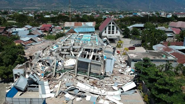 Remains of a ten-storey hotel in Palu in Indonesia’s Central Sulawesi after it collapsed during the disaster. Indonesia, which sits on the seismically active Pacific Ring of Fire, is familiar with deadly earthquakes and tsunamis. In 2004, a quake off Sumatra island triggered a tsunami across the Indian Ocean, killing 226,000 people in 13 countries, including more than 120,000 in Indonesia. (AFP) Remains of a ten-storey hotel in Palu in Indonesia’s Central Sulawesi after it collapsed during the disaster. Indonesia, which sits on the seismically active Pacific Ring of Fire, is familiar with deadly earthquakes and tsunamis. In 2004, a quake off Sumatra island triggered a tsunami across the Indian Ocean, killing 226,000 people in 13 countries, including more than 120,000 in Indonesia. (AFP)