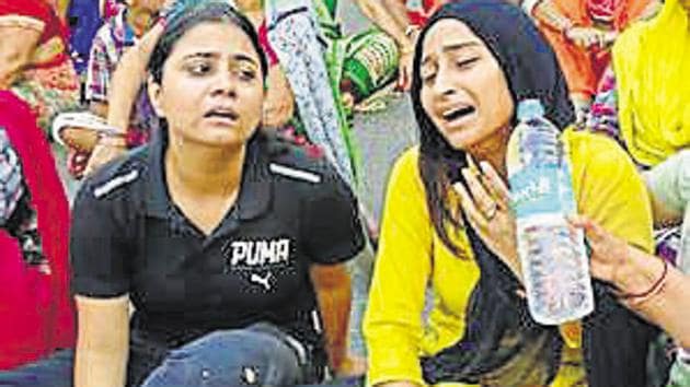 Grieving relatives of Rupesh Besoya, who was shot dead by an alleged drug peddlar in southeast Delhi’s Taimur Nagar. (Sourced) Grieving relatives of Rupesh Besoya, who was shot dead by an alleged drug peddlar in southeast Delhi’s Taimur Nagar. (Sourced)