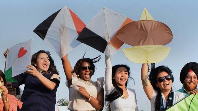 Delegates from different countries try their hands on kite flying during the 13th Global Youth Peace Festival at the Indian School of Business in Mohali on Monday. (HT Photo) Delegates from different countries try their hands on kite flying during the 13th Global Youth Peace Festival at the Indian School of Business in Mohali on Monday. (HT Photo)