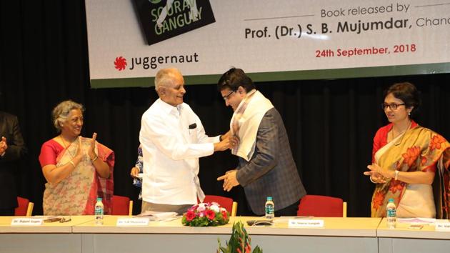 (From left) Rajani R Gupte, vice-­chancellor of Symbiosis International (deemed university); professor SB Mujumdar, chancellor; Sourav Ganguly, former Indian cricket captain and Vidya Yeravdekar, pro-chancellor, during the launch of the cricketer’s book A Century Is Not Enough at the university’s Lavale campus on Monday,  September 24, 2018. (HT PHOTO) 