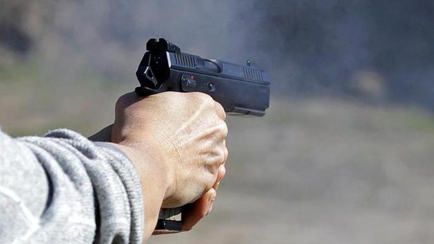 Police said the accused waylaid the woman in the lane outside her house and shot her. Despite being shot, she managed to run away and lock herself in a neighbour’s house. (Reuters File / Representative Image) Police said the accused waylaid the woman in the lane outside her house and shot her. Despite being shot, she managed to run away and lock herself in a neighbour’s house. (Reuters File / Representative Image)