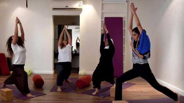 “Five years ago, this (teaching yoga) would have been impossible,” added Marwaai, as she began training a cluster of women students at a private studio in the Red Sea city of Jeddah. Hanging up their body-shrouding abayas and headscarves, the women stretched in unison in an arching warrior pose known as “virabhadrasana”. (Amer Hilabi / AFP)