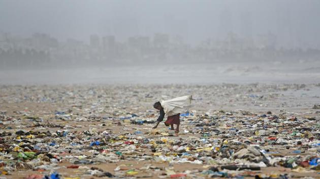 A lady picks plastic bottles from garbage seen at Juhu Beachin Mumbai. The bustling coastal city of 20 million people, has long been awash with vast amounts of plastic rubbish, like many urban centres in India. Plastic is regularly blamed for blocking drains and contributing to flooding during the city’s four-month-long summer monsoon (Satyabrata Tripathy / HT Archive) A lady picks plastic bottles from garbage seen at Juhu Beachin Mumbai. The bustling coastal city of 20 million people, has long been awash with vast amounts of plastic rubbish, like many urban centres in India. Plastic is regularly blamed for blocking drains and contributing to flooding during the city’s four-month-long summer monsoon (Satyabrata Tripathy / HT Archive)
