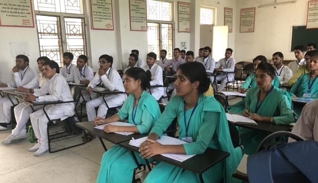Students attend a class in Uttarakhand Sanskrit University in Haridwar. (HT Photo) Students attend a class in Uttarakhand Sanskrit University in Haridwar. (HT Photo)