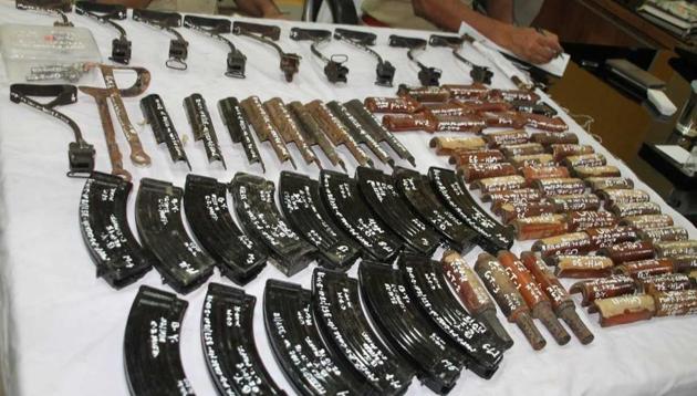 The seized spare parts of AK-­47 rifles which were recovered by Munger police from a house in village Dilawarpur.(HT Photo)