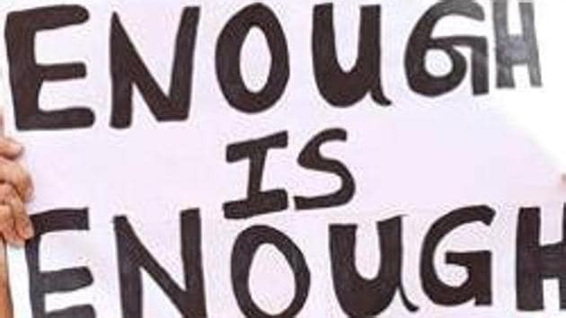 Activists hold placards during a rally protest against the recent incidents of sexual abuse, molestation and rapes in Bangalore. (AFP File Photo/Representative image) Activists hold placards during a rally protest against the recent incidents of sexual abuse, molestation and rapes in Bangalore. (AFP File Photo/Representative image)