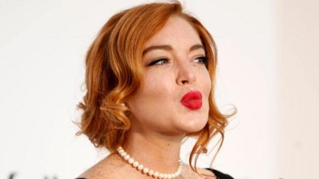 Lindsay Lohan poses at the 70th Cannes Film Festival. Lindsay Lohan poses at the 70th Cannes Film Festival.