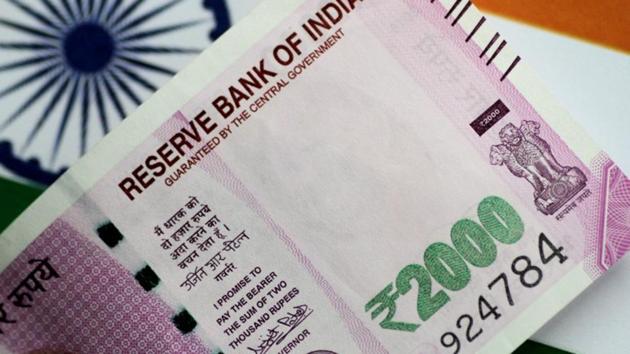 The rupee opened lower at 73.26 and weakened further to quote at 73.34 a dollar against its previous closing of 72.91 Monday. (Reuters File Photo) The rupee opened lower at 73.26 and weakened further to quote at 73.34 a dollar against its previous closing of 72.91 Monday. (Reuters File Photo)