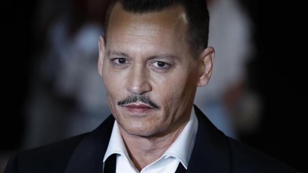 In this file photo taken on November 2, 2017 US actor Johnny Depp poses upon arrival to attend the world premiere of the film Murder on the Orient Express at the Royal Albert Hall in west London.(AFP)
