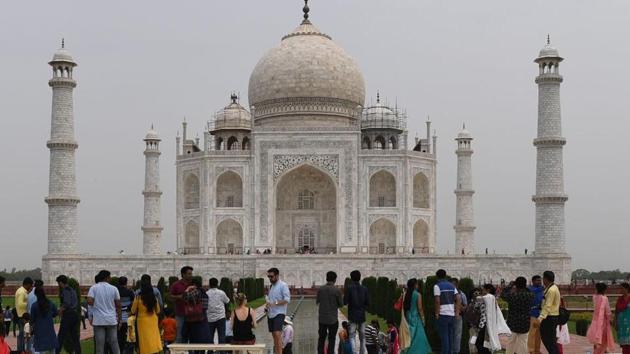 Tourists at the Taj Mahal in Agra.(AFP File Photo)