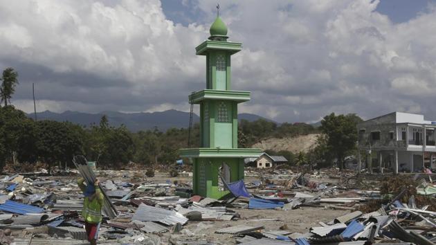 Almost 2,00,000 people need urgent help, the UN’s humanitarian office said, among them tens of thousands of children, with an estimated 66,000 homes destroyed or damaged by the 7.5-magnitude quake and the tsunami it spawned. (AP) Almost 2,00,000 people need urgent help, the UN’s humanitarian office said, among them tens of thousands of children, with an estimated 66,000 homes destroyed or damaged by the 7.5-magnitude quake and the tsunami it spawned. (AP)