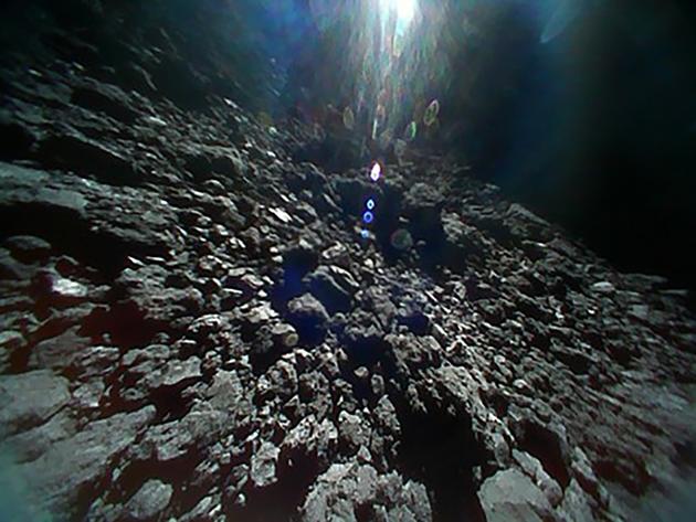 This picture released by JAXA on September 27, 2018, shows the Ryugu asteroid surface image.(AFP)