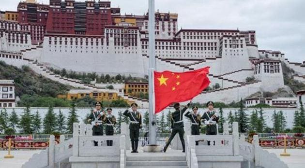 The Chinese national flag is raised during a ceremony marking the 96th anniversary of the founding of the Communist Party of China (CPC) at Potala Palace in Lhasa, Tibet Autonomous Region, China, in July 2017.(Reuters File Photo)