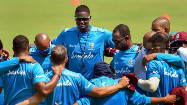 Rajkot: West Indies' captain Jason Holder with the teammates during a practice session ahead of the first cricket test match against India.(PTI)