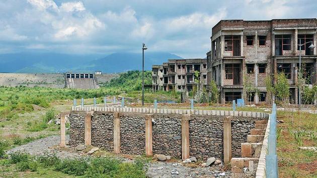 The DLF residential enclave is being built on the floodplains with the dam close by. (HT Photo) The DLF residential enclave is being built on the floodplains with the dam close by. (HT Photo)