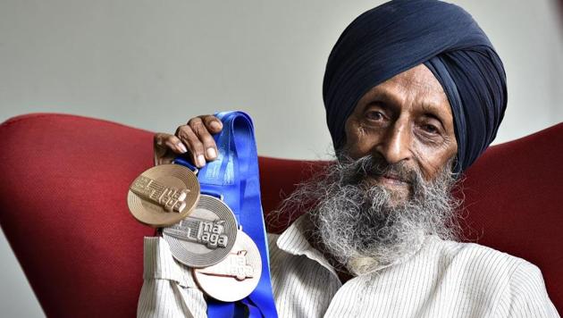 Hardev Singh Flora won a gold in 80m hurdles, silver in 200m hurdles and bronze in triple jump in the 85 to 89-year category in Malaga.(HT Photo)