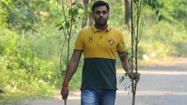 In six years, Amit Rathi and villagers of Gairatpur Baas have planted more than 30,000 saplings of indigenous trees in the Aravallis.(Parveen Kumar / HT Photo)