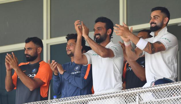 Indian cricketers (L-R) Mohammed Shami, Kuldeep Yadav, Ajinkya Rahane and Virat Kohli aplaud after teammate Prithvi Shaw scored a century (100 runs) during the first of the first Test cricket match between India and West Indies at the Saurashtra Cricket Association stadium in Rajkot. (AFP) Indian cricketers (L-R) Mohammed Shami, Kuldeep Yadav, Ajinkya Rahane and Virat Kohli aplaud after teammate Prithvi Shaw scored a century (100 runs) during the first of the first Test cricket match between India and West Indies at the Saurashtra Cricket Association stadium in Rajkot. (AFP)