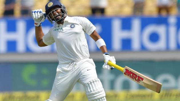 India's Prithvi Shaw celebrates after scoring a century against West Indies. (AFP)
