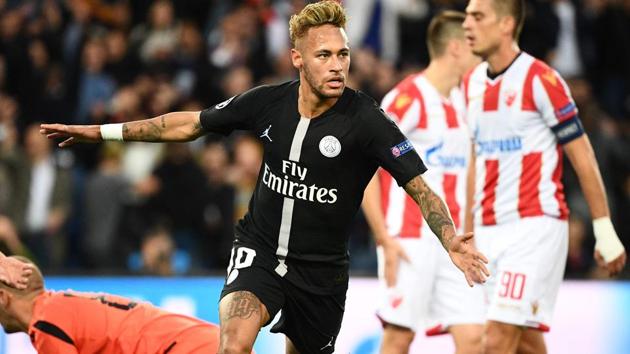 Paris Saint-Germain's Neymar celebrates after scoring a second goal against Red Star Belgrade.(AFP)