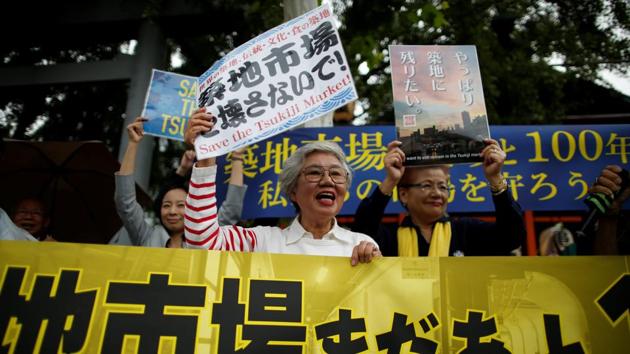 75-year-old Tai Yamaguchi takes part in a rally. Some 300 fishmongers and activists voiced their anger during a protest at Tsukiji last Saturday, chanting “Toyosu No No No,” and waving banners saying “Stop the Relocation!” “We finally made Tsukiji a famous brand and now they’re trying to destroy it,” said Kiyoshi Kimura, who owns one of Japan’s largest sushi chains. (Issei Kato / REUTERS)