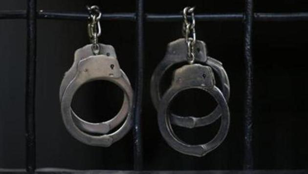 Handcuffs hang in a prison.(REUTERS/Representative image)