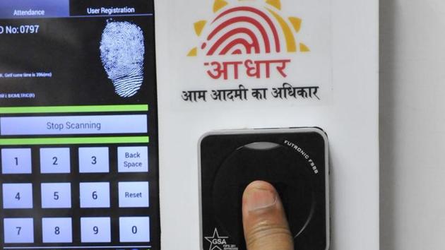 New Delhi, India, July 24, 2013 :: Employees mark their attendance through Aadhaar based System in the Planning Commission. The system is installed at the enters of the main Yojana Bhawan building on Wednesday, July 24, 2013 (Photo by Vipin Kumar/Hindustan Times) story pics for Chetan Chauhan New Delhi, India, July 24, 2013 :: Employees mark their attendance through Aadhaar based System in the Planning Commission. The system is installed at the enters of the main Yojana Bhawan building on Wednesday, July 24, 2013 (Photo by Vipin Kumar/Hindustan Times) story pics for Chetan Chauhan