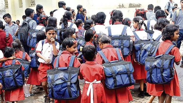 Paediatricians in the city are of the opinion that school bags for children below 10 years should not be above four to five kg in weight. doctors have reported cases of back pain, bad posture and lordosis caused by the burden of school bags(HT PHOTO)