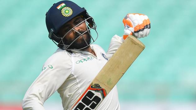 Ravindra Jadeja celebrates after reaching his century (100 runs) against West Indies.(AFP)