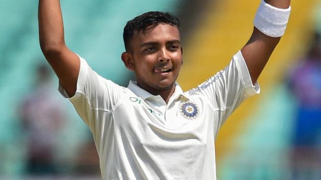 Prithvi Shaw celebrates his century during Day 1 of the first Test between India and West Indies in Rajkot.(PTI)