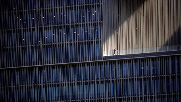 An employee talks on a phone at an office building in Seoul, South Korea. (Kim Hong-Ji / REUTERS) An employee talks on a phone at an office building in Seoul, South Korea. (Kim Hong-Ji / REUTERS)
