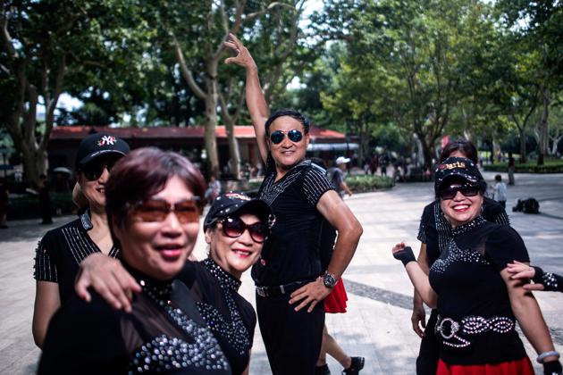 A man from a square dancing team striking a pose. Even the government has jumped on the bandwagon to extol the health benefits. “Square dancing happens wherever there is a square,” said Wang Guangcheng, a fitness instructor and choreographer who helps the government devise dance routines and is widely known as China’s “Square Dance Prince”. (Johannes Eisele / AFP) A man from a square dancing team striking a pose. Even the government has jumped on the bandwagon to extol the health benefits. “Square dancing happens wherever there is a square,” said Wang Guangcheng, a fitness instructor and choreographer who helps the government devise dance routines and is widely known as China’s “Square Dance Prince”. (Johannes Eisele / AFP)