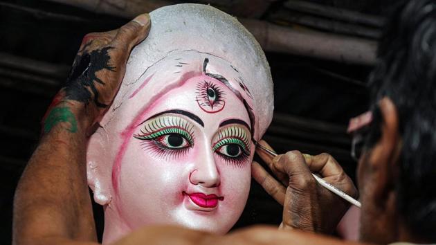 An artisan paints an idol of the goddess Durga ahead of Durga puja festival, in Ranchi, Jharkhand, on October 2, 2018. (PTI) An artisan paints an idol of the goddess Durga ahead of Durga puja festival, in Ranchi, Jharkhand, on October 2, 2018. (PTI)