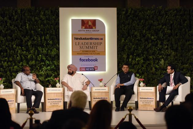 (L-R) Karnataka chief minister H D Kumaraswamy, Punjab chief minister Captain Amarinder Singh and Maharashtra chief minister Devendra Fadnavis at HTLS 2018. “Punjab is feeding the country but the country is not feeding us. We have no industry,” the Punjab CM said. CM Kumaraswamy said his state still faces the water dispute issue, while CM Fadnavis said bringing fuel under GST could help reduce prices but alternatives were needed. (Burhaan Kinu / HT Photo)