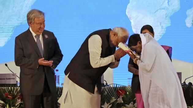 Prime Minister Narendra Modi (C) greets spiritual leader Mata Amritanandamay i(R), as UN Secretary-General Antonio Guterres looks on during the closing function of the Mahatma Gandhi International Sanitation Convention in New Delhi, on October 2, 2018. The spiritual leader was felicitated for her financial contribution to the Swachh Bharat program. (Manish Swarup / Pool / AP) Prime Minister Narendra Modi (C) greets spiritual leader Mata Amritanandamay i(R), as UN Secretary-General Antonio Guterres looks on during the closing function of the Mahatma Gandhi International Sanitation Convention in New Delhi, on October 2, 2018. The spiritual leader was felicitated for her financial contribution to the Swachh Bharat program. (Manish Swarup / Pool / AP)