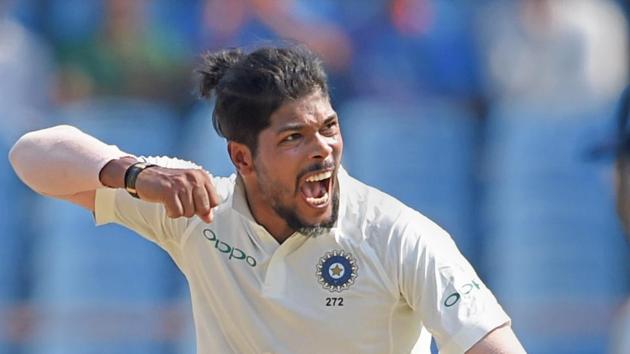 Rajkot: Indian bowler Umesh Yadav celebrates the wicket of West Indies batsman Keemo Paul during the first test cricket match played between India and West Indies.(PTI)