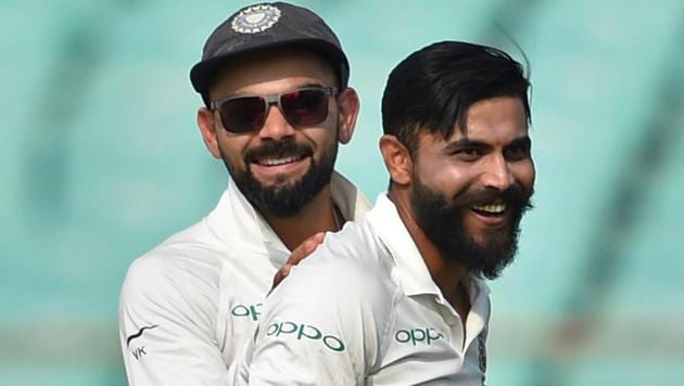 Ravindra Jadeja (R) celebrates the wicket of West Indies batsman Sunil Ambris in Rajkot.(PTI)