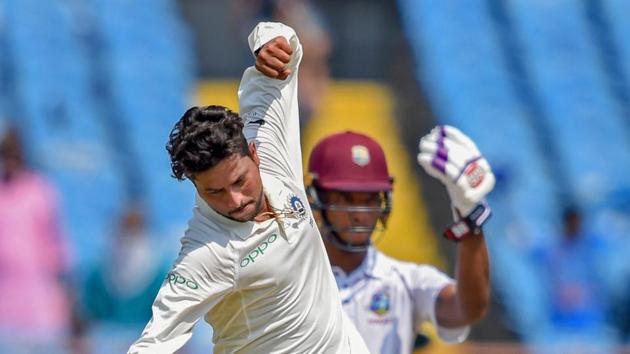 Rajkot: Indian bowler Kuldeep Yadav celebrates the wicket of West Indies batsman Sunil Ambris during their first test cricket match, in Rajkot. (PTI) Rajkot: Indian bowler Kuldeep Yadav celebrates the wicket of West Indies batsman Sunil Ambris during their first test cricket match, in Rajkot. (PTI)