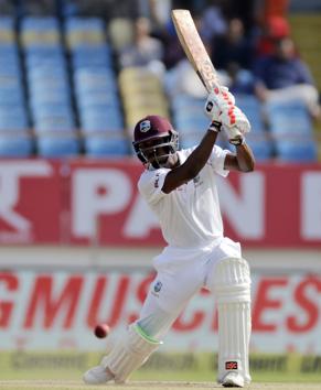 West Indies' cricketer Keemo Paul bats during the third day of the first cricket test match between India and West Indies in Rajkot. (AP)