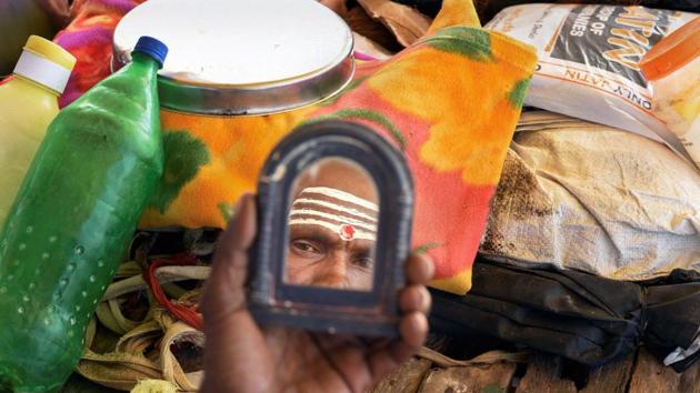 A ‘sadhu’ applies sandalwood paste after taking a holy dip in the Ganga on the occasion of Navami Shraddha Tithi (Matra Navami) of Pitru Paksha, at Sangam, in Allahabad on October 3, 2018. (PTI) A ‘sadhu’ applies sandalwood paste after taking a holy dip in the Ganga on the occasion of Navami Shraddha Tithi (Matra Navami) of Pitru Paksha, at Sangam, in Allahabad on October 3, 2018. (PTI)