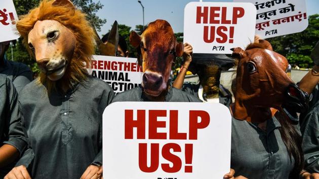 People for the Ethical Treatment of Animal (PETA) volunteers wear masks of various animals during a protest in New Delhi, on October 1, 2018. The group has requested central government to strengthen the animal-protection laws which are nearly six decades old. (Chandan Khanna / AFP) People for the Ethical Treatment of Animal (PETA) volunteers wear masks of various animals during a protest in New Delhi, on October 1, 2018. The group has requested central government to strengthen the animal-protection laws which are nearly six decades old. (Chandan Khanna / AFP)