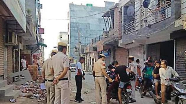 Police at the scene of the crime. (HT Photo) Police at the scene of the crime. (HT Photo)