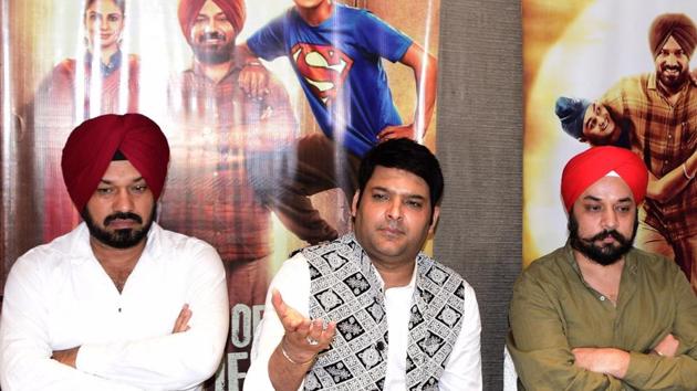 Gurpreet Ghuggi and producers Kapil Sharma and Sumeet Singh during the promotions of their upcoming film Son Of Manjeet Singh, in Amritsar.(IANS)