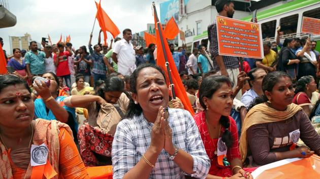 A woman chants hymns during a protest called by various Hindu organisations against the lifting of ban by Supreme Court that allowed entry of women to the Sabarimala temple, in Kochi, India, October 2, 2018(REUTERS) A woman chants hymns during a protest called by various Hindu organisations against the lifting of ban by Supreme Court that allowed entry of women to the Sabarimala temple, in Kochi, India, October 2, 2018(REUTERS)