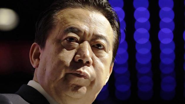 Meng Hongwei delivers his opening address at the Interpol World congress in Singapore on July 4, 2017. Chinese authorities say they are investigating the former president of Interpol for bribery and other crimes. (AP) Meng Hongwei delivers his opening address at the Interpol World congress in Singapore on July 4, 2017. Chinese authorities say they are investigating the former president of Interpol for bribery and other crimes. (AP)