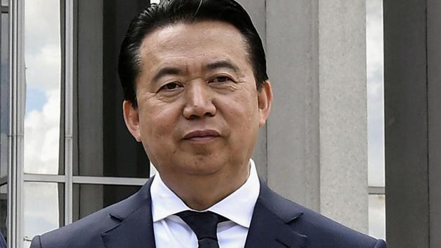 Meng Hongwei poses during a visit to the headquarters of International Police Organisation in Lyon, France, May 8, 2018.(Reuters)