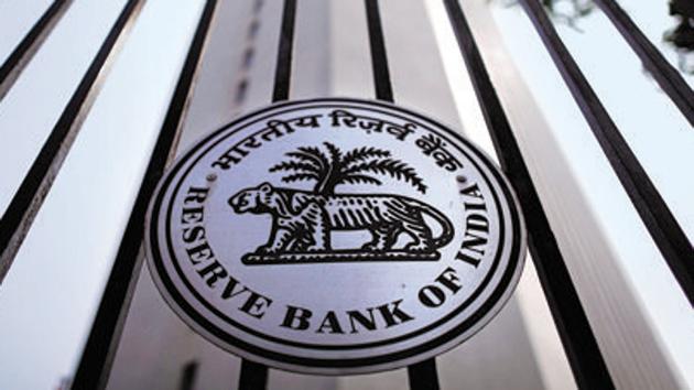 The Reserve Bank of India (RBI) seal is pictured on a gate outside the RBI headquarters in Mumbai October 29, 2013. India's central bank raised its policy interest rate for the second time in as many months on Tuesday, warning that inflation is likely to remain elevated for the rest of the fiscal year, and rolled back an emergency measure put in place in July to support the slumping rupee. REUTERS/Danish Siddiqui (INDIA - Tags: BUSINESS POLITICS LOGO) - RTX14S9A (Reuters File Photo) The Reserve Bank of India (RBI) seal is pictured on a gate outside the RBI headquarters in Mumbai October 29, 2013. India's central bank raised its policy interest rate for the second time in as many months on Tuesday, warning that inflation is likely to remain elevated for the rest of the fiscal year, and rolled back an emergency measure put in place in July to support the slumping rupee. REUTERS/Danish Siddiqui (INDIA - Tags: BUSINESS POLITICS LOGO) - RTX14S9A (Reuters File Photo)
